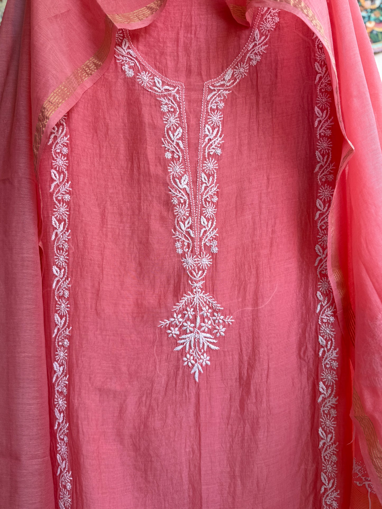Close-up of authentic handcrafted Chikankari embroidery on Mul Chanderi fabric