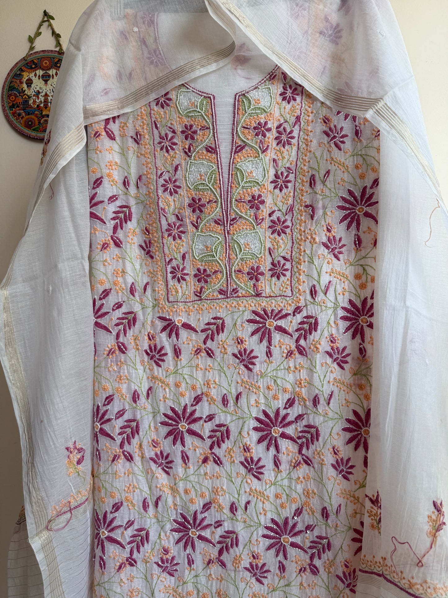 Pure Mul Chanderi Lucknowi Chikankari suit set in off-white with handcrafted embroidery and delicate sequin, pearl, and cutdana work