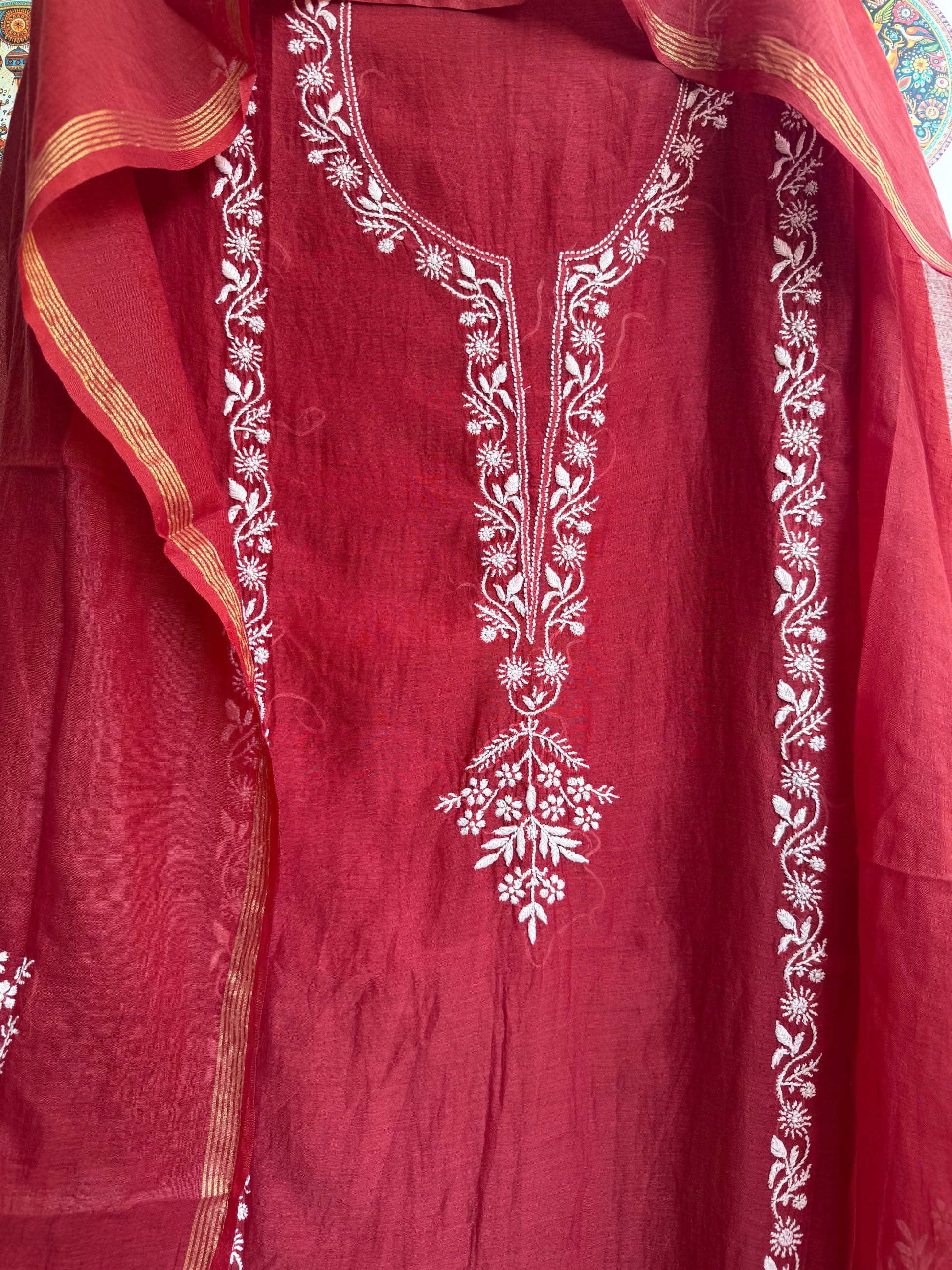 Close-up of authentic handcrafted Chikankari embroidery on Mul Chanderi fabric
