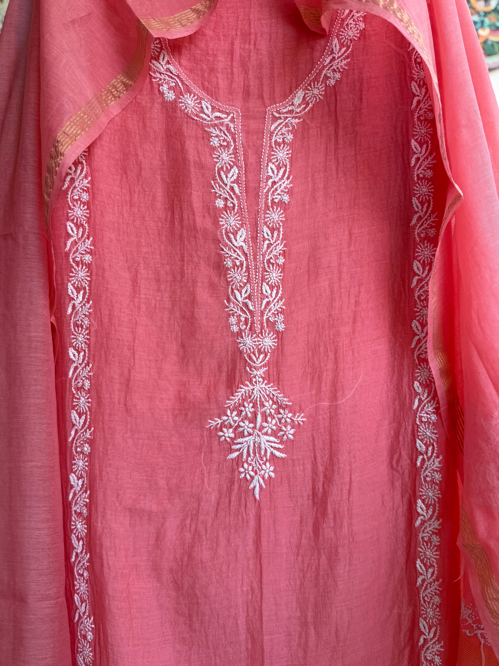 Close-up of authentic handcrafted Chikankari embroidery on Mul Chanderi fabric
