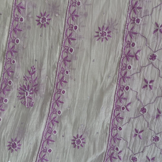 Elegant cream and lilac Chikankari Anarkali set styled for festive and summer occasions